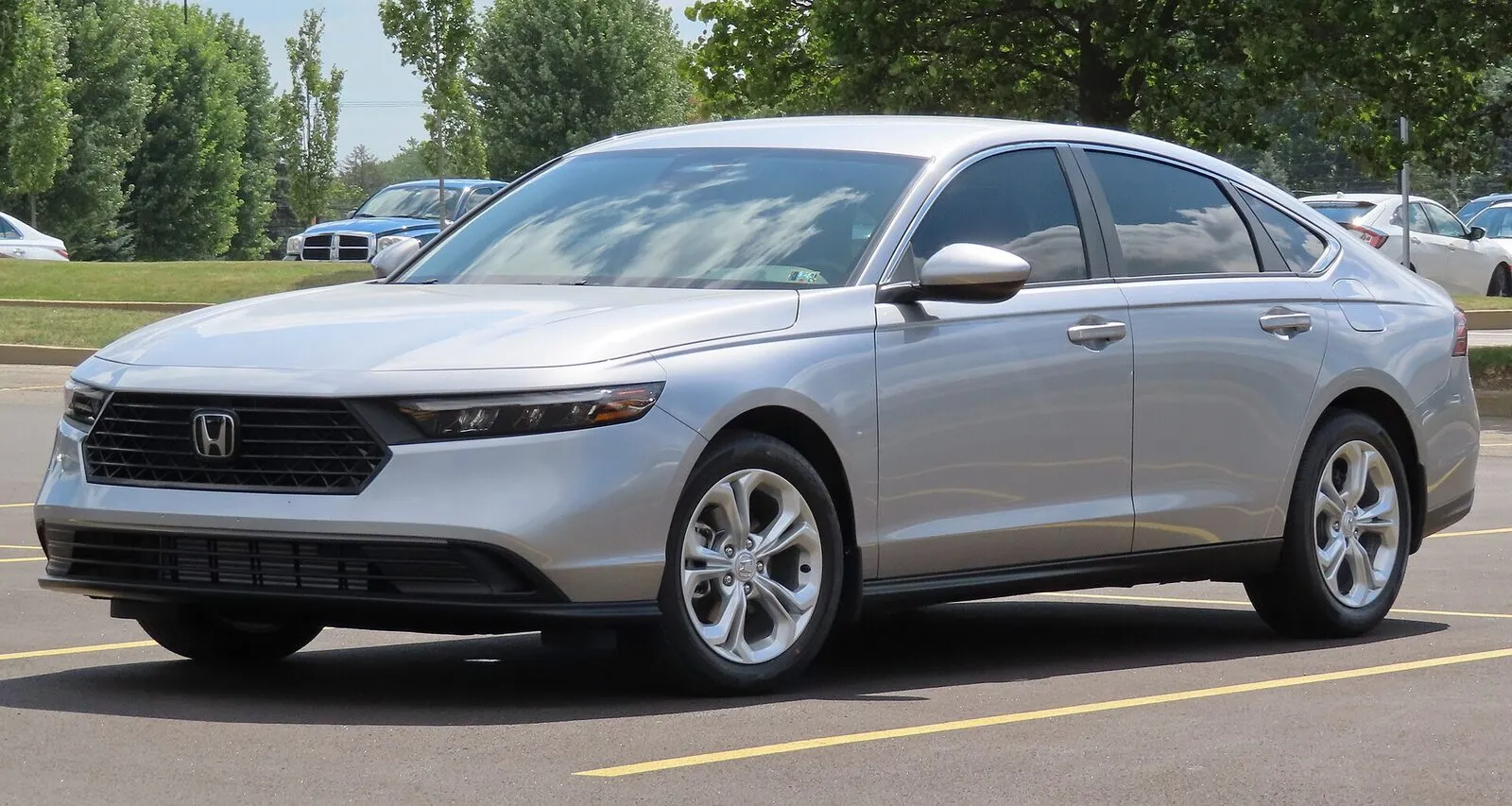 2023 Honda Accord LX sedan in silver, front three-quarter view