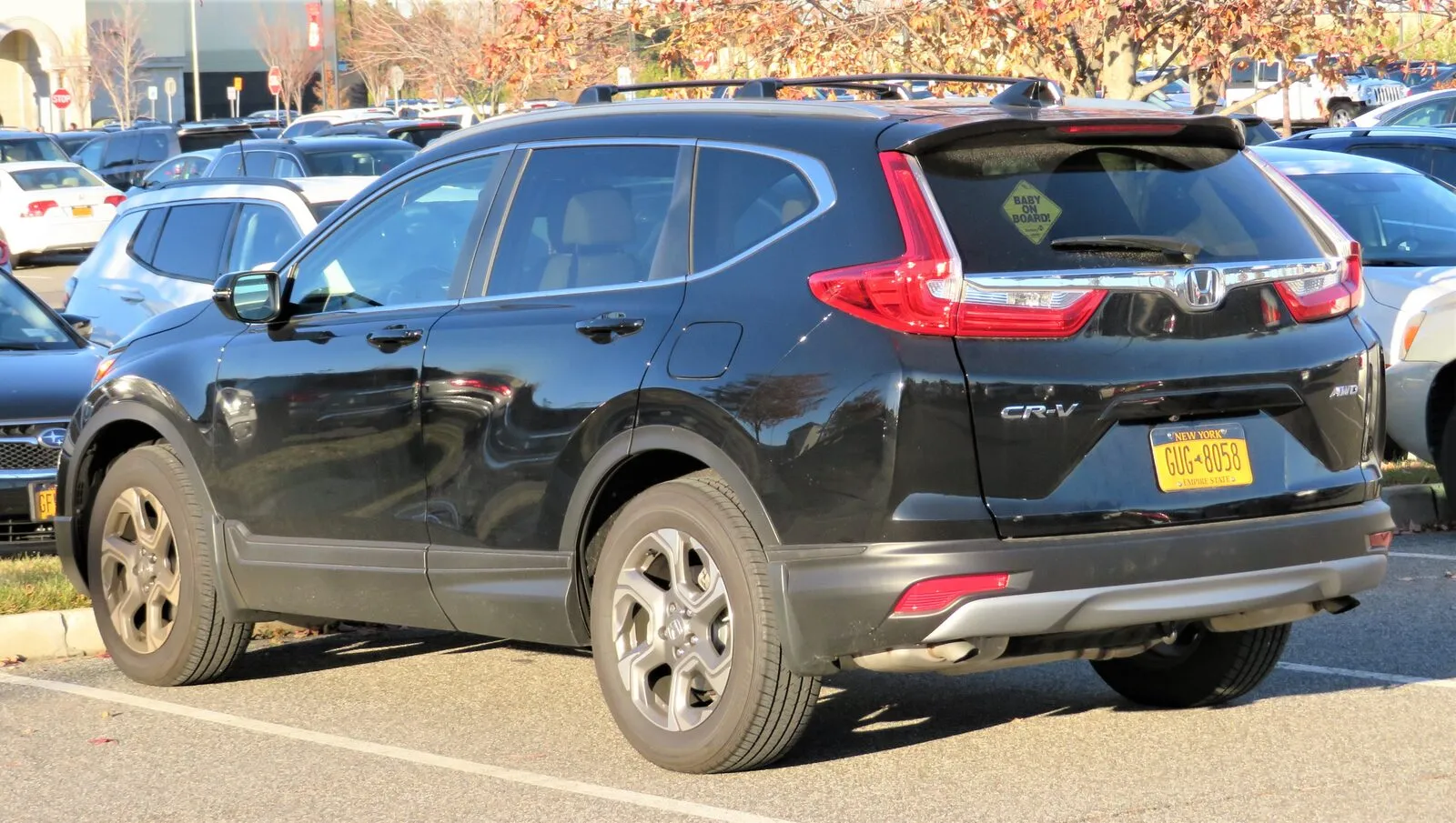 Honda CR-V of the fifth generation in black, rear three-quarter view