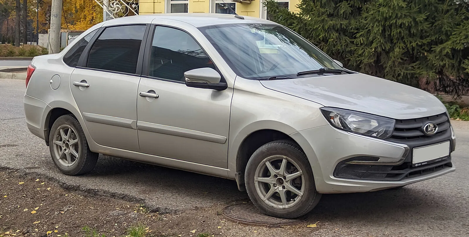 Lada Granta sedan in silver, front three-quarter view